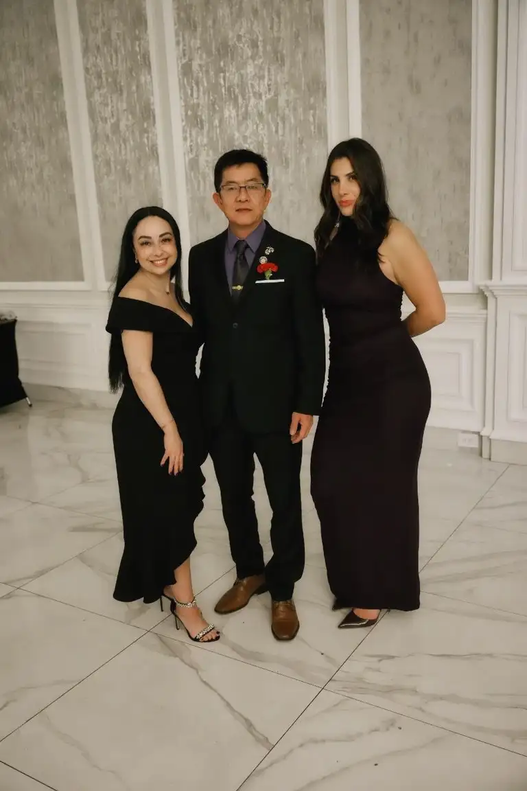 Three guests in evening wear at a Brooklyn GOP gala