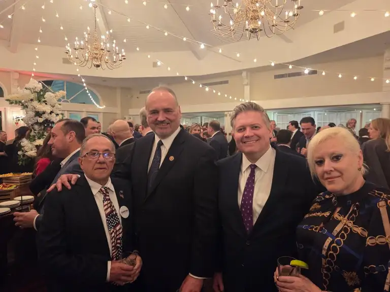Guests beneath chandeliers at the Brooklyn GOP Lincoln Day Gala reception